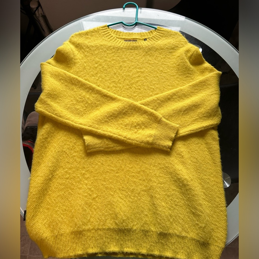 A Superdry yellow crew neck